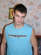 Blue shirt twink boy looks stoned out of his mind