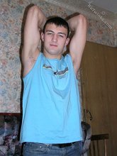 Blue shirt twink boy looks stoned out of his mind