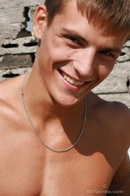 Cheerful brunette stud revealing his meaty cock