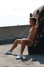 Cheerful brunette stud revealing his meaty cock