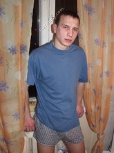 Blond-haired beauty showing off his curved cock