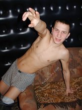 Playful twink revealing his bent cock on camera