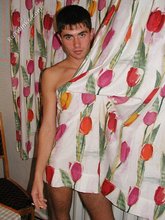 Dark-haired young boy seducing in the bathroom