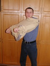 Lovely-looking twink lifts up his shirt to expose that bod