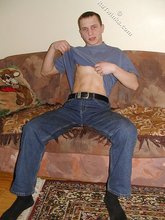 Lovely-looking twink lifts up his shirt to expose that bod