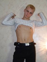 Sensual blond-haired twink flashing that ass of his
