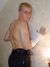 Sensual blond-haired twink flashing that ass of his
