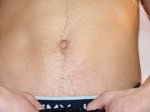 Sensual blond-haired twink flashing that ass of his