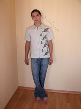 Dark-haired twink slowly but surely undressing on cam