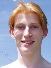 Redheaded twink shows his feet and his sexy body