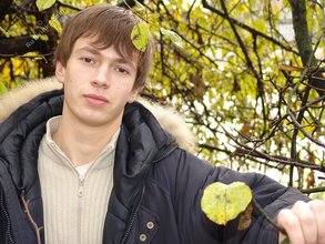 Dark-haired twink posing outdoors (with rope)