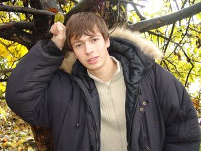 Dark-haired twink posing outdoors (with rope)