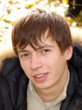 Dark-haired twink posing outdoors (with rope)