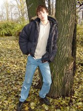 Dark-haired twink posing outdoors (with rope)