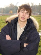 Dark-haired twink posing outdoors (with rope)