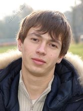 Dark-haired twink posing outdoors (with rope)