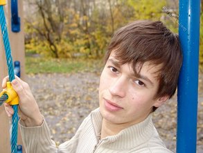 Dark-haired twink posing outdoors (with rope)