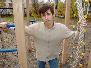 Dark-haired twink posing outdoors (with rope)