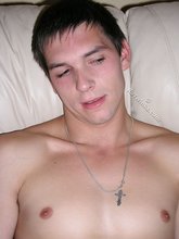 Dark-haired pretty boy slowly stroking that dick