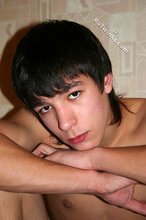 Dark-haired twink posing and flashing his sexy pubes
