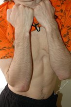Gangsta twink showing his armpits and abs on cam