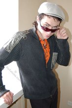 Shades-wearing twink posing seductively on camera