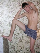 Skinny twink showing off his ass and his armpits