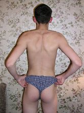 Skinny twink showing off his ass and his armpits