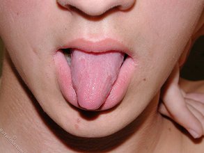Hairy cock twink stroking and sticking his tongue out