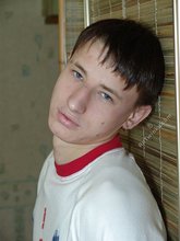 Pouty dark-haired guy shows his sexy arms and abs