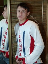 Pouty dark-haired guy shows his sexy arms and abs