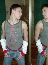 Pouty dark-haired guy shows his sexy arms and abs