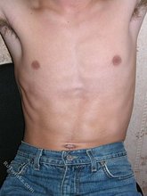 Flamboyant gay boy showing off his ass from behind