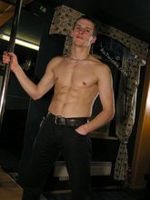 Jacked-up twink posing with his abs exposed, enjoy