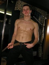 Jacked-up twink posing with his abs exposed, enjoy