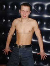 Seductive twink tries hiding his sizable junk