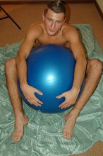 Tanned twink fucks a fitness ball and looks gorgeous