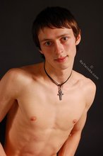 Jacked-up stud stroking his cock and showing his ass