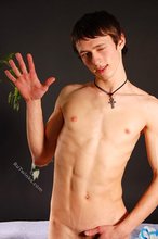 Dark-haired twink winking at you after busting a nut