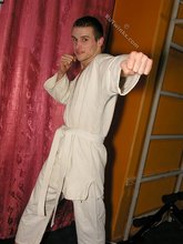 Karate twink practicing his sick punches and posing naked