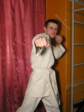 Karate twink practicing his sick punches and posing naked