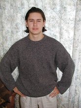 Baby-faced brunette twink shows off his abs on cam