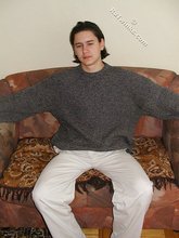 Baby-faced brunette twink shows off his abs on cam