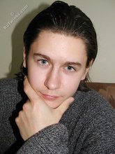 Baby-faced brunette twink shows off his abs on cam