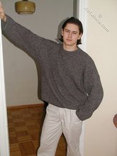 Baby-faced brunette twink shows off his abs on cam