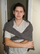 Baby-faced brunette twink shows off his abs on cam