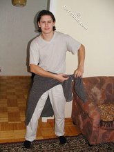 Baby-faced brunette twink shows off his abs on cam