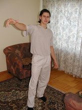 Baby-faced brunette twink shows off his abs on cam