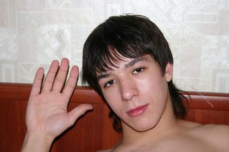 Dark-haired young boy waves you goodbye after an orgasm