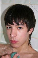 Sexy twink with hot feet posing in the bathroom